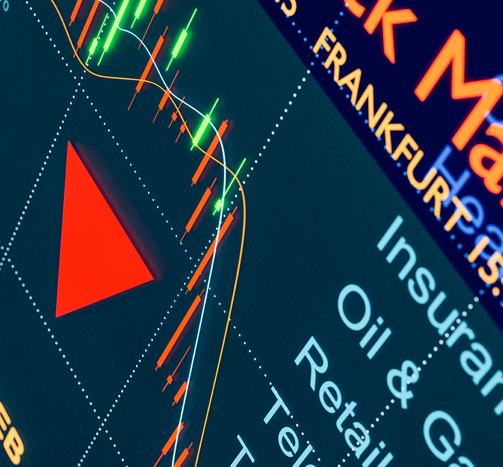 Close-up trading monitor with stock market candle chart