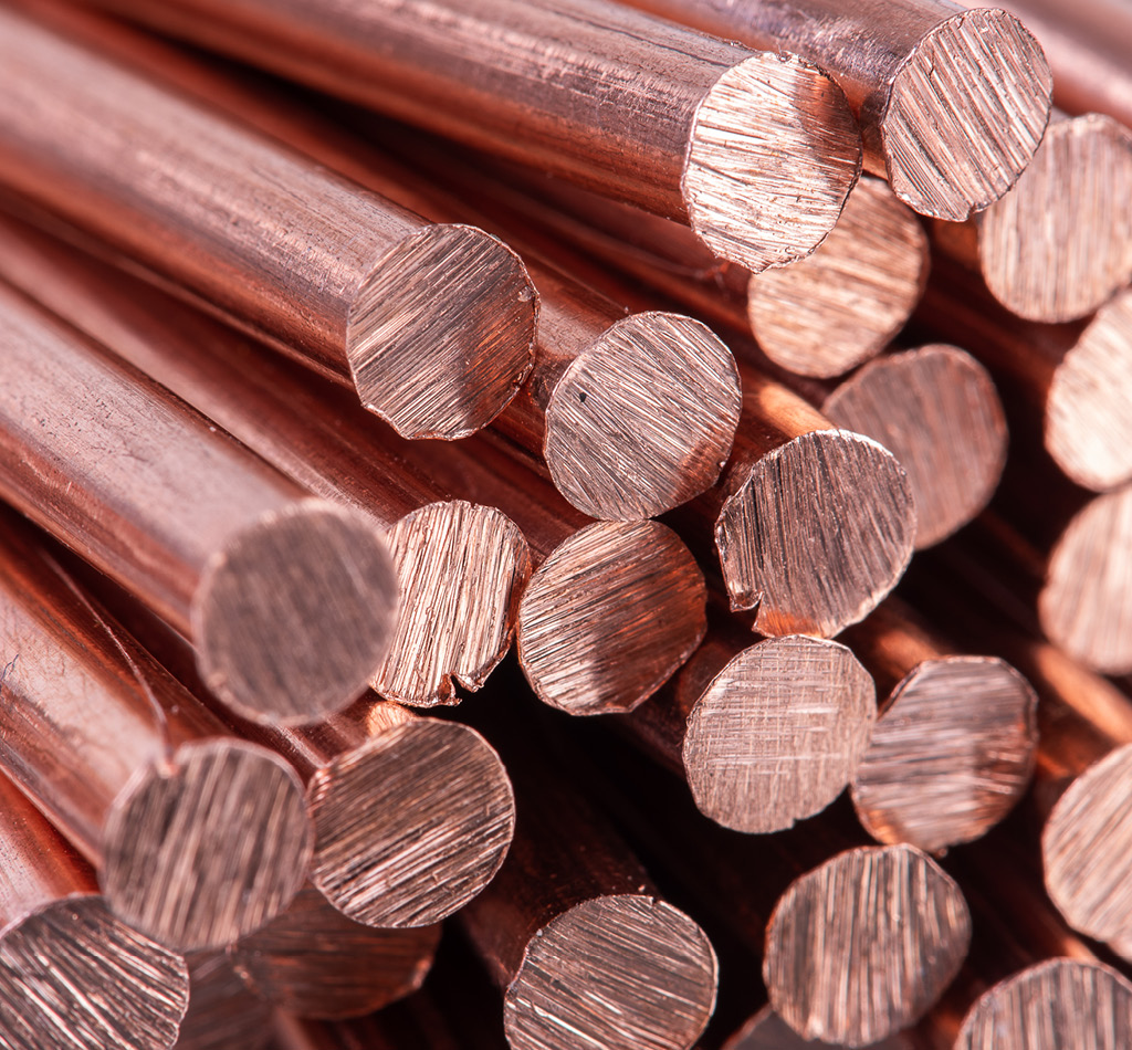 Close-up of a pile of copper rods.